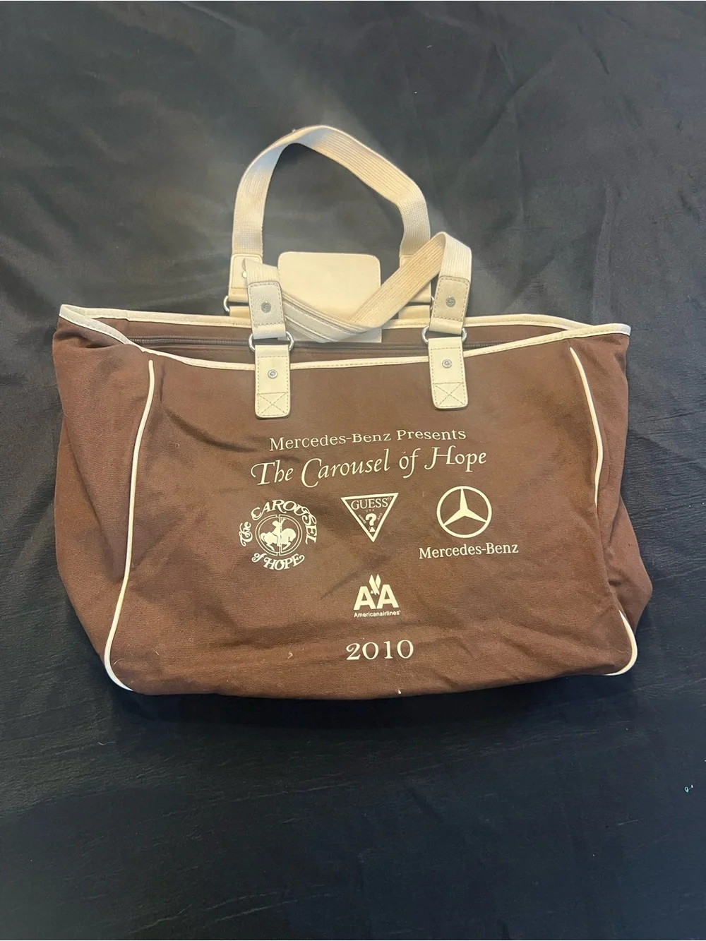 Guess brown logo